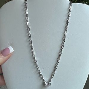 Pretty link and crystal necklace.  Goes with anything.  Bought but never worn.
